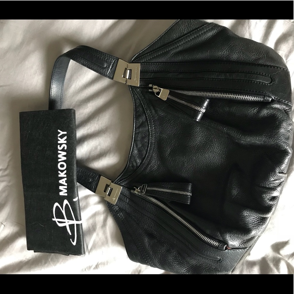 B. Makowsky black leather handbag
